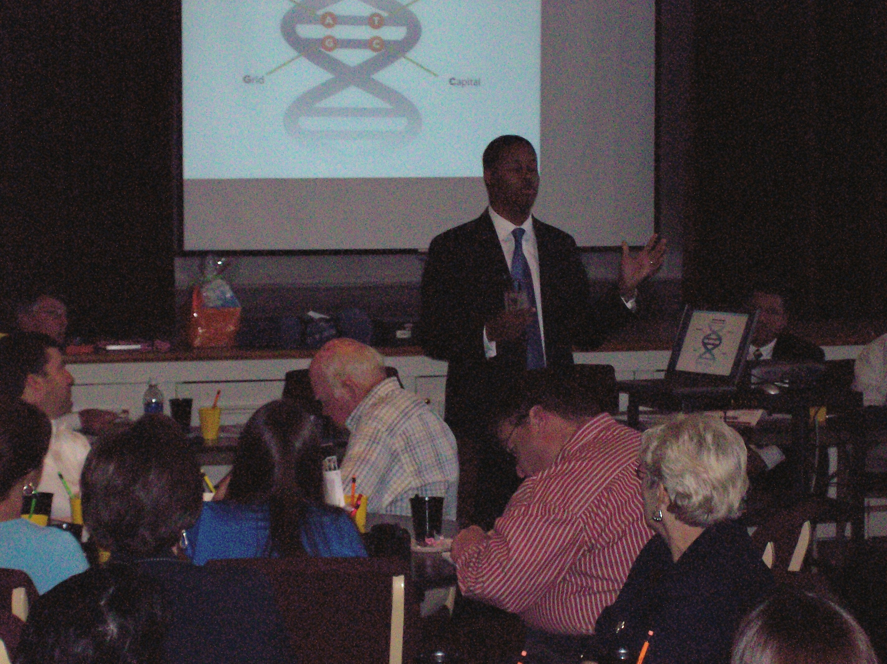 Man gives a speech on the double helix